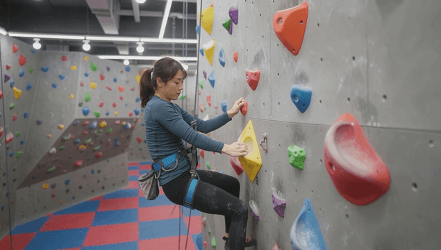 Indoor climbing with colorful holds