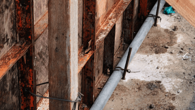 Construction site with metal and wood structures