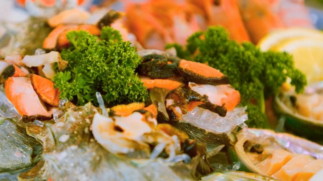 Fresh seafood platter with lemon slices
