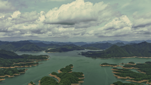 Vast lake surrounded by lush mountains