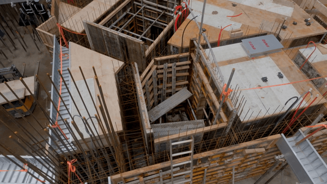 Construction site with scaffolding and beams