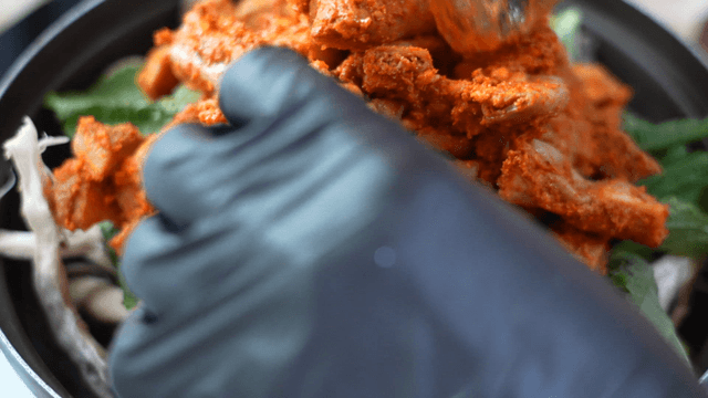 Ingredients for beef tripe hotpot added to pot