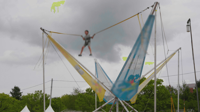 Boy enjoying euro bungee jumping