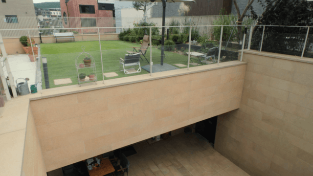 Modern courtyard with garden and seating area