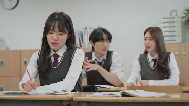 Student bowing head in frustration after being teased