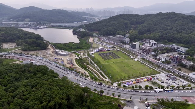 A scenic view of a park and cityscape