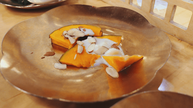 Pumpkin slices with almond toppings