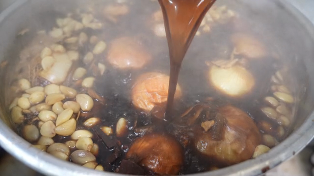 Herbal ingredients boiling in a pot