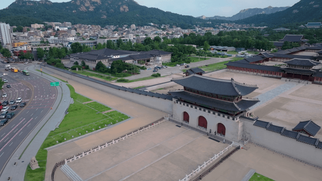 Historic palace with mountains in the background