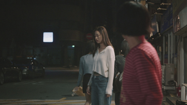 Anxious woman with three friends leaving