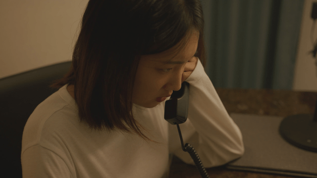 Woman talking on the telephone