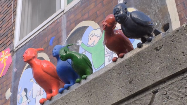 Colorful sculptures on a wall