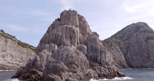 Majestic cliffs by the sea under a clear sky