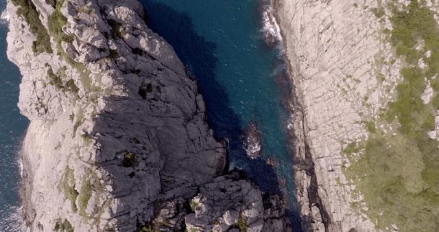 Rocky cliffs meeting the ocean waves