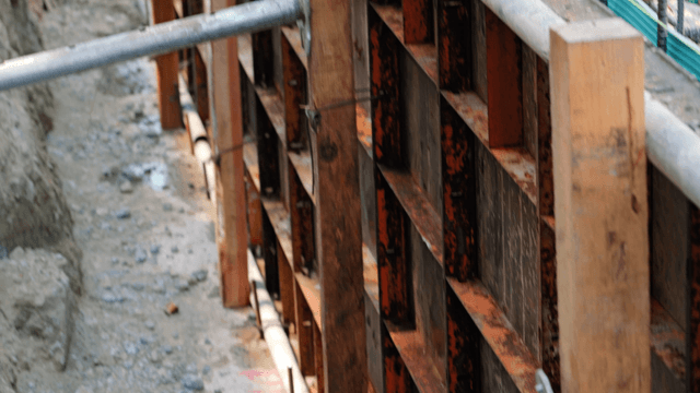 Construction site with metal and wood structures