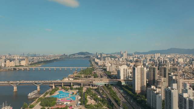 A sprawling cityscape with a river view