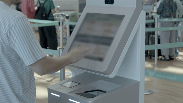 Person using a kiosk at the airport