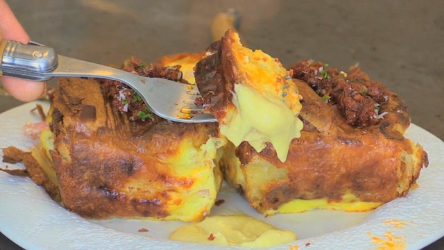 Croissant dipped in sauce