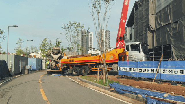 Construction site with crane and truck