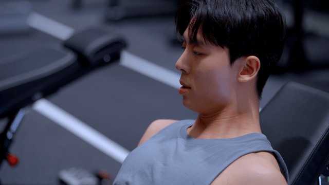 Man exercising on a leg press machine