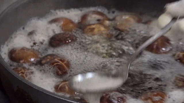 Mushrooms boiling in a pot