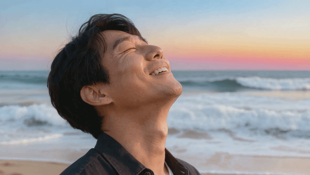 Man enjoying a serene beach at sunset