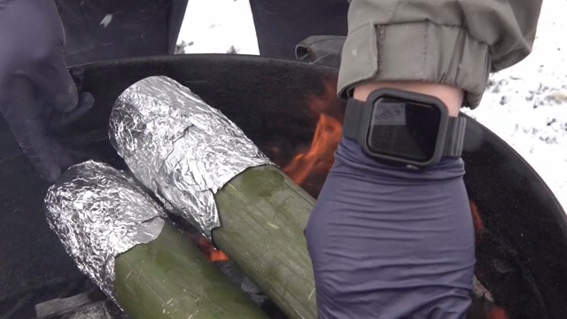 Cooking bamboo over an open fire