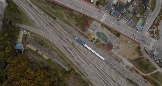 Aerial view of a train station and roads