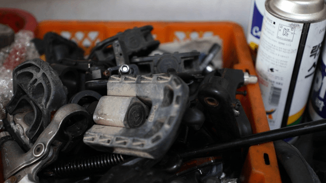 Collection of bicycle parts in a box