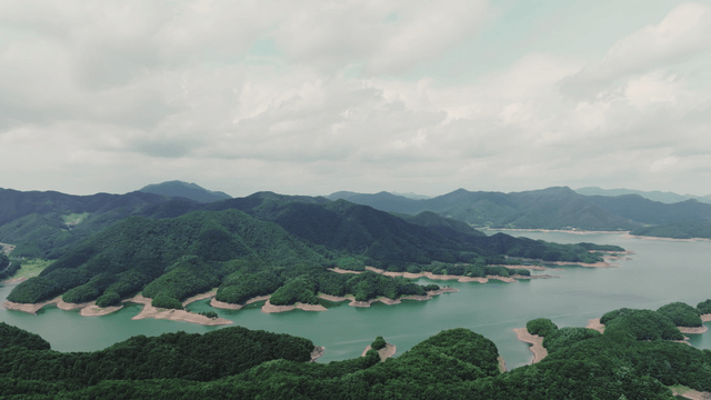 Vast lake surrounded by lush mountains
