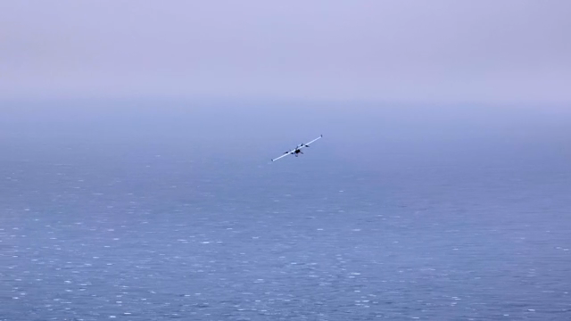 Drone flying over the vast ocean