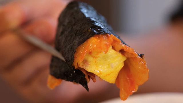 Kimchi and rolled omelet wrapped in seaweed