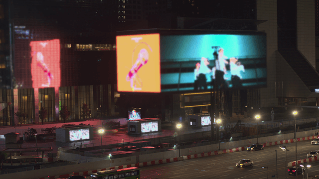 Large digital billboard in the city at night