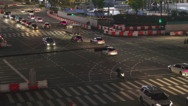 Busy intersection at night