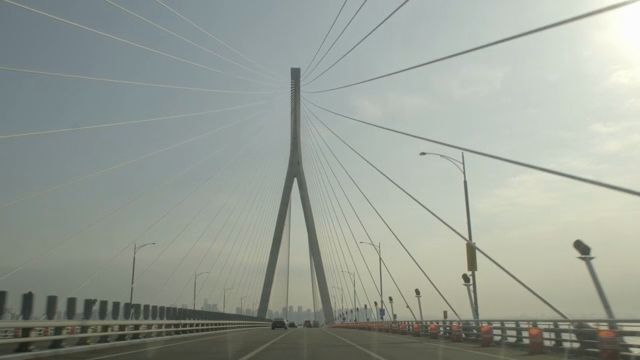 Cars driving on a large suspension bridge