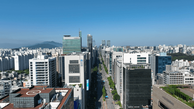 A bustling cityscape with tall buildings