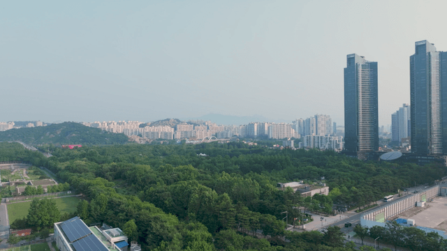 Green forest among Seoul high-rise buildings