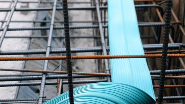 Construction site with steel rebar and cables