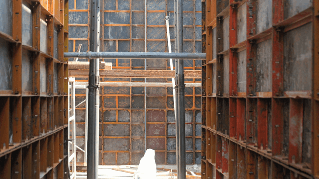 Inside a construction site with scaffolding