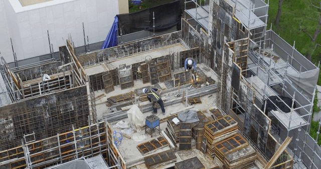 Construction workers building a structure