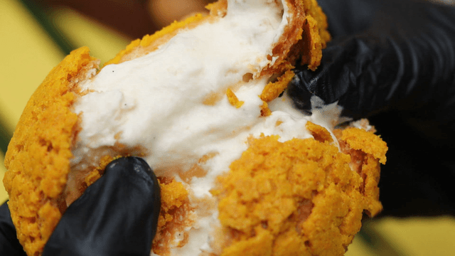 Splitting cream-filled bread by hand