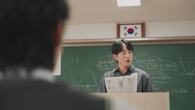 Teacher giving a lecture in a classroom