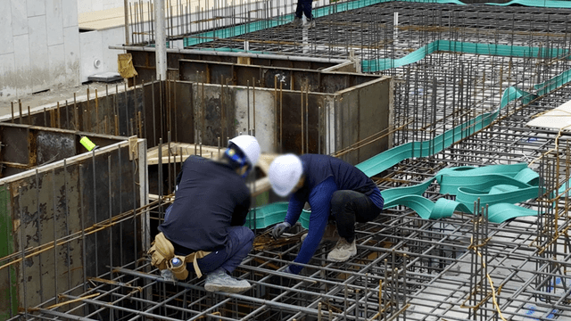 Construction workers at a building site