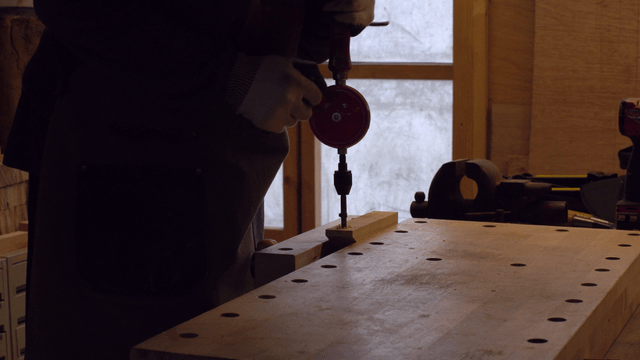 Person working with tools in a workshop