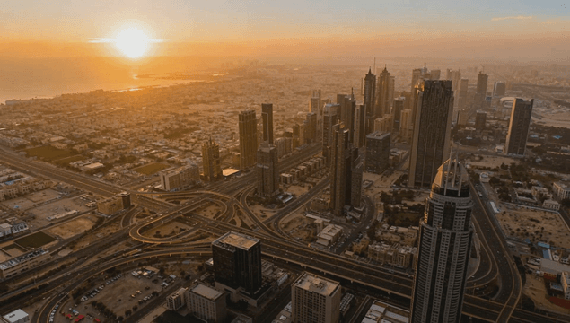 Bustling cityscape at sunset