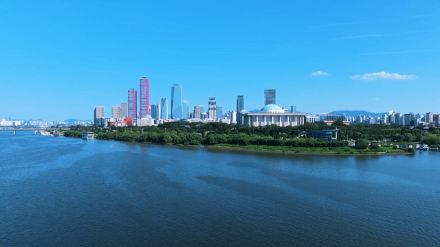 Wide Han River with unique high-rise buildings
