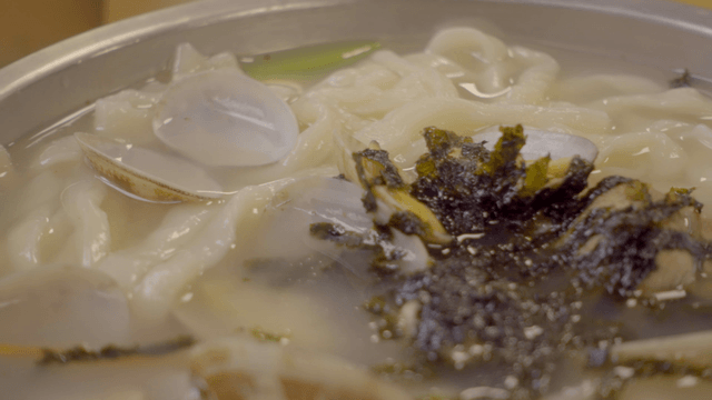 Korean clam noodle soup in a bowl