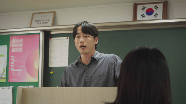 Teacher giving a serious lecture in the classroom