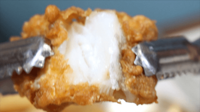 Fried codfish torn with tongs