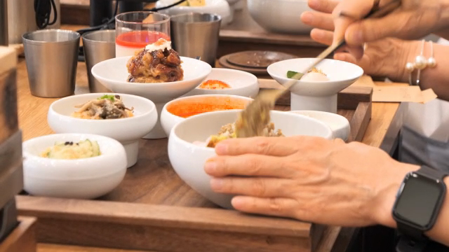Korean dishes being enjoyed at a restaurant